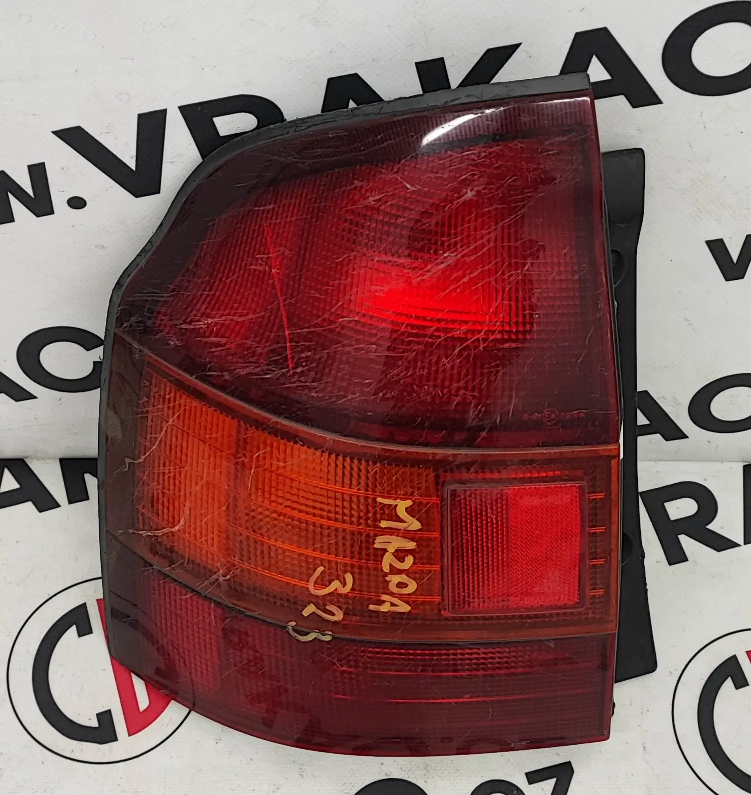 Světlomet zadní levý – Mazda 323 1994-2001
