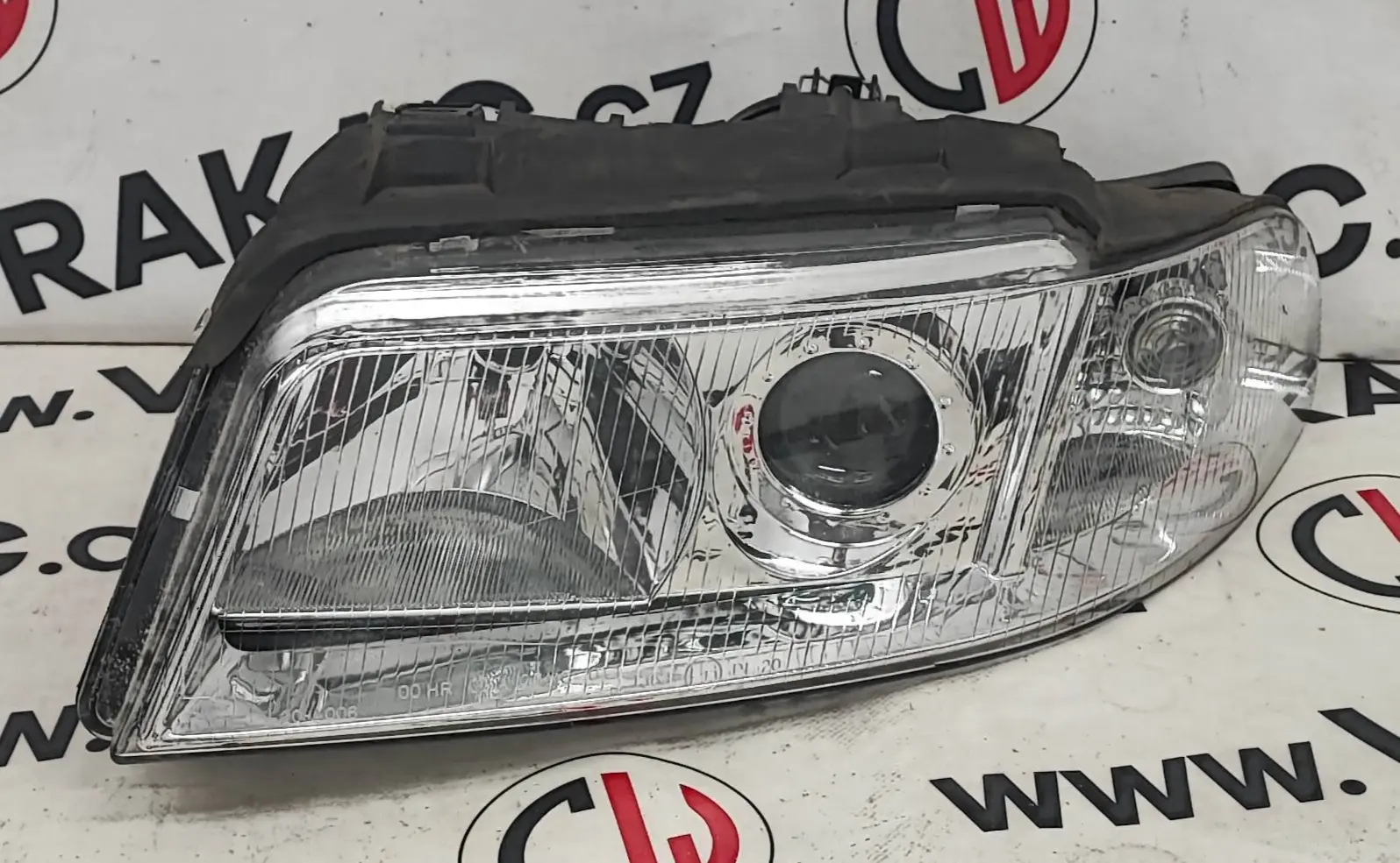 Světlomet levý předni – Audi A4 1994-2001