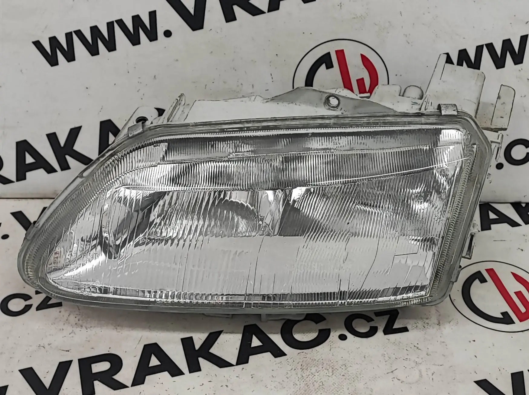 Světlomet levý přední – Renault Laguna 1993-2001