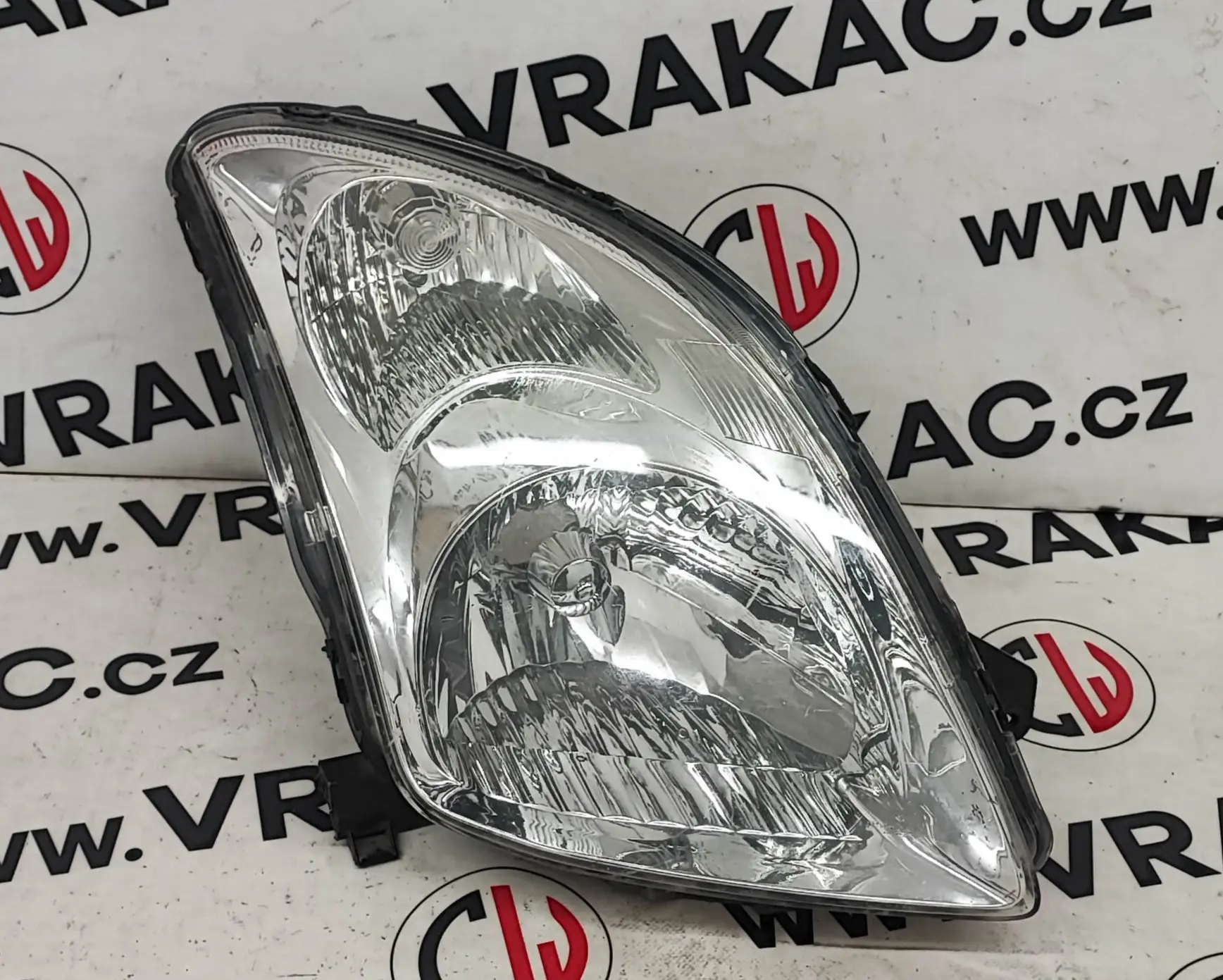 Světlomet pravý přední (35100-62J11) – Suzuki Swift 2005-2008