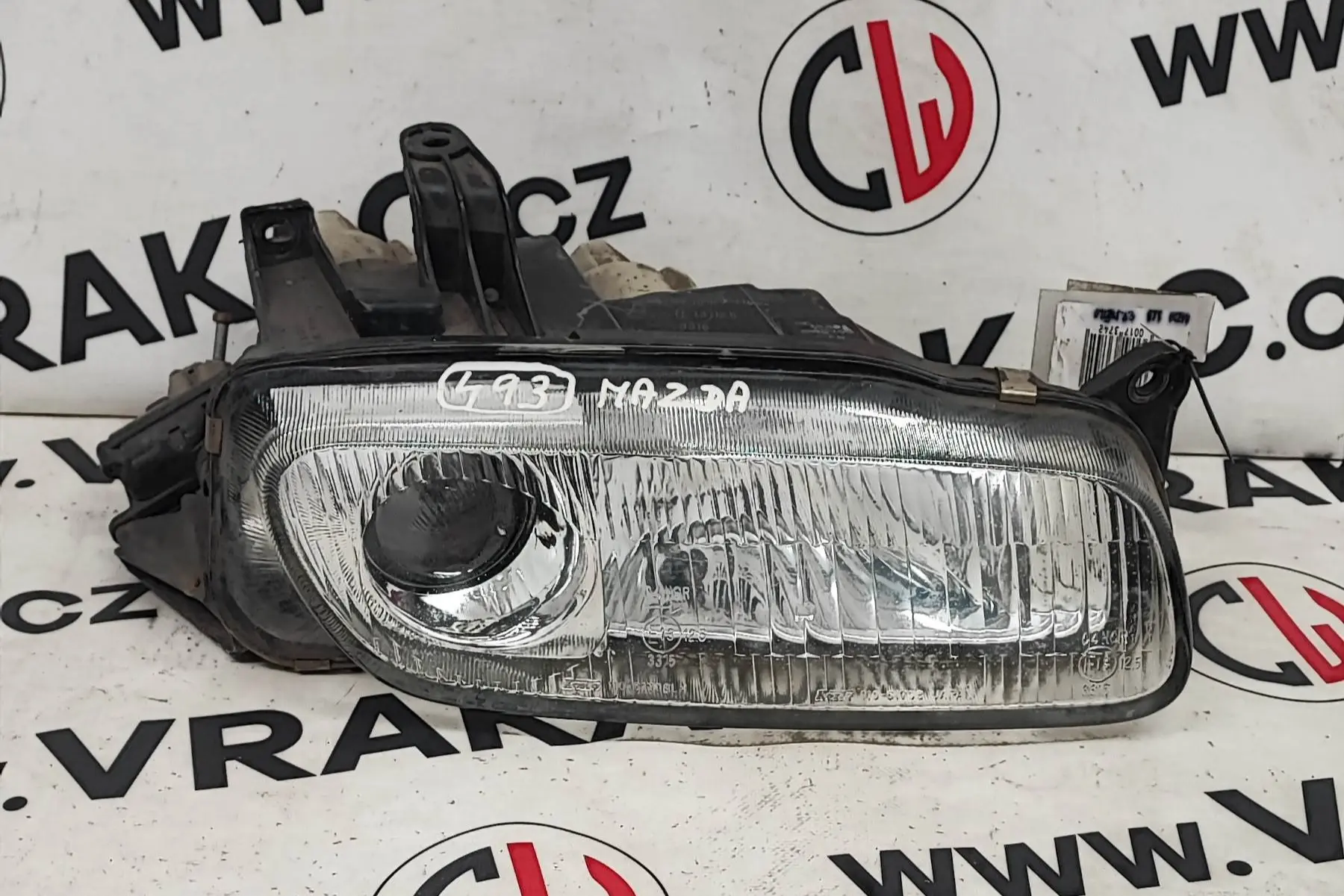 Světlomet pravý přední – Mazda 323 1994-2001