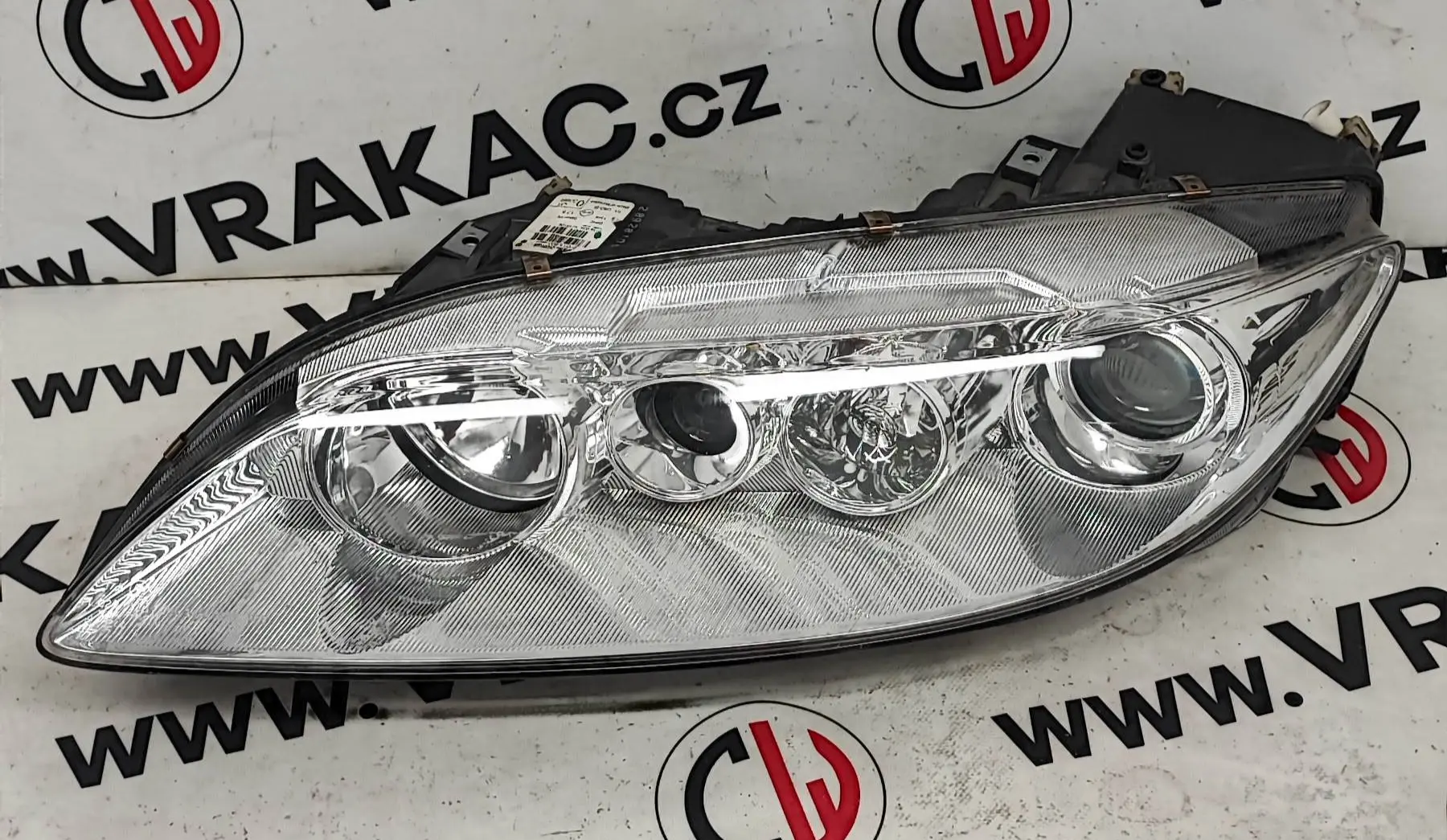 Světlomet levý přední – Mazda 6 2002-2007