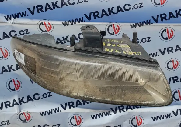 Světlomet pravý přední (04576312AD) – Chrysler Voyager 1996-2001